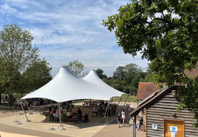 A shade tensile canopy for a courtyard space.
