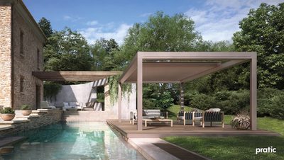 A retractable pergola next to a swimming pool in a holiday house.